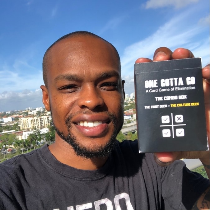 Customer holding The Combo Box outdoors